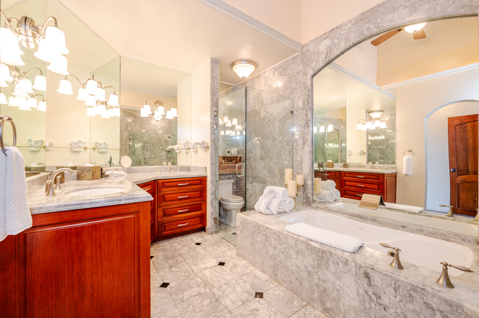 Elegant marble bathroom with soaking tub and double vanity in luxury Costa Rica villa – Charity Ace package highlight