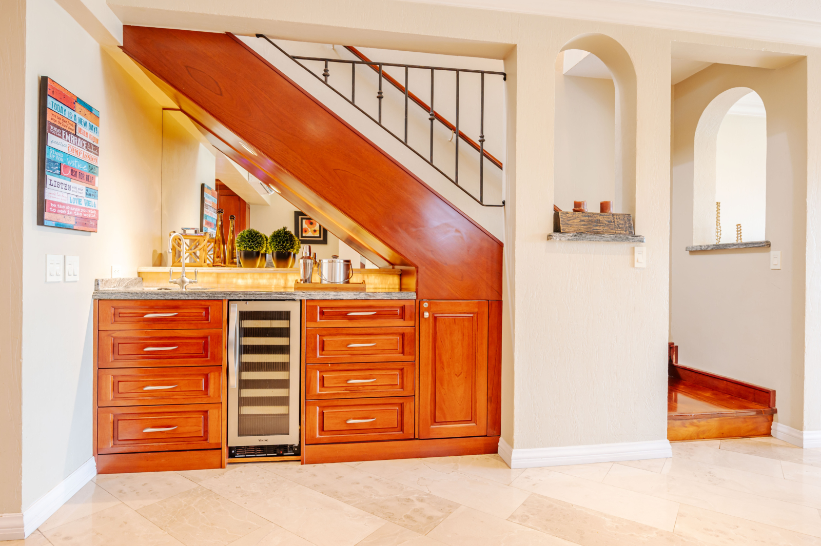 Stylish built-in wet bar under staircase with wine fridge in Costa Rica beachfront villa – Charity Ace fundraising package